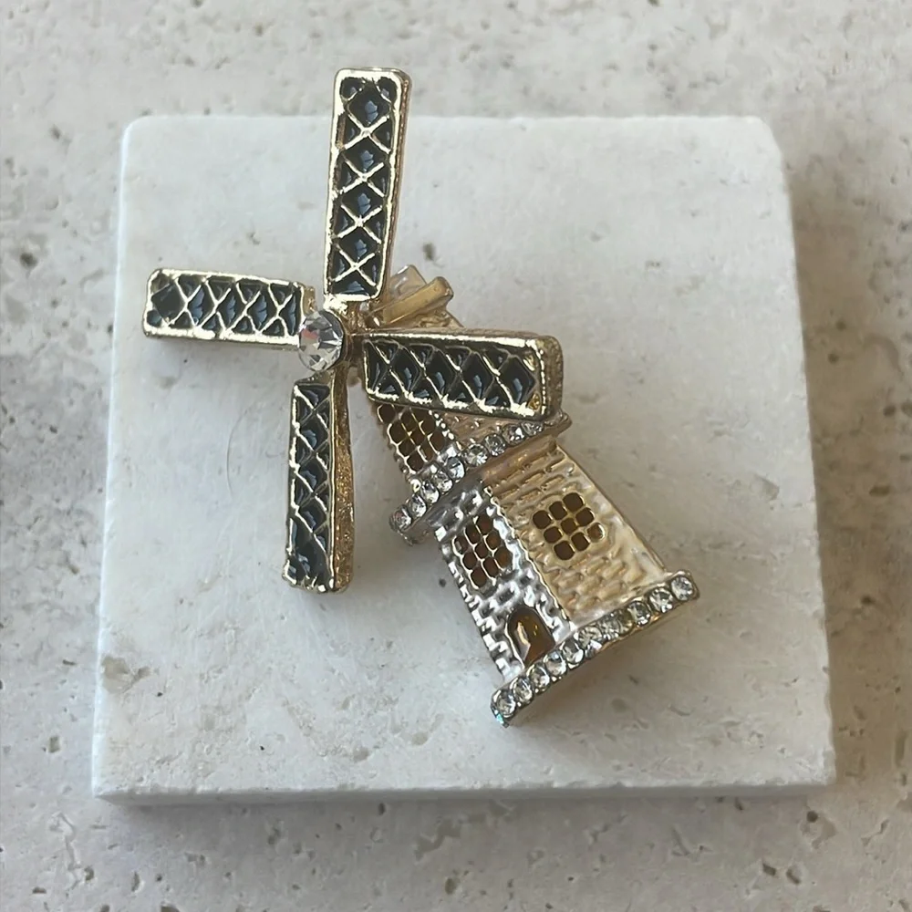 ANTHROPOLOGIE windmill  Gold Tone Brooch